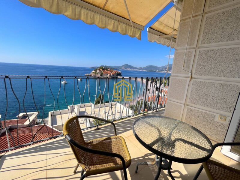 For sale spacious two bedroom apartment with stunning views on the first line in Sveti Stefan